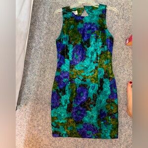 Gorgeous floral cocktail dress thin silk. Lasts a lifetime. Looks great on!